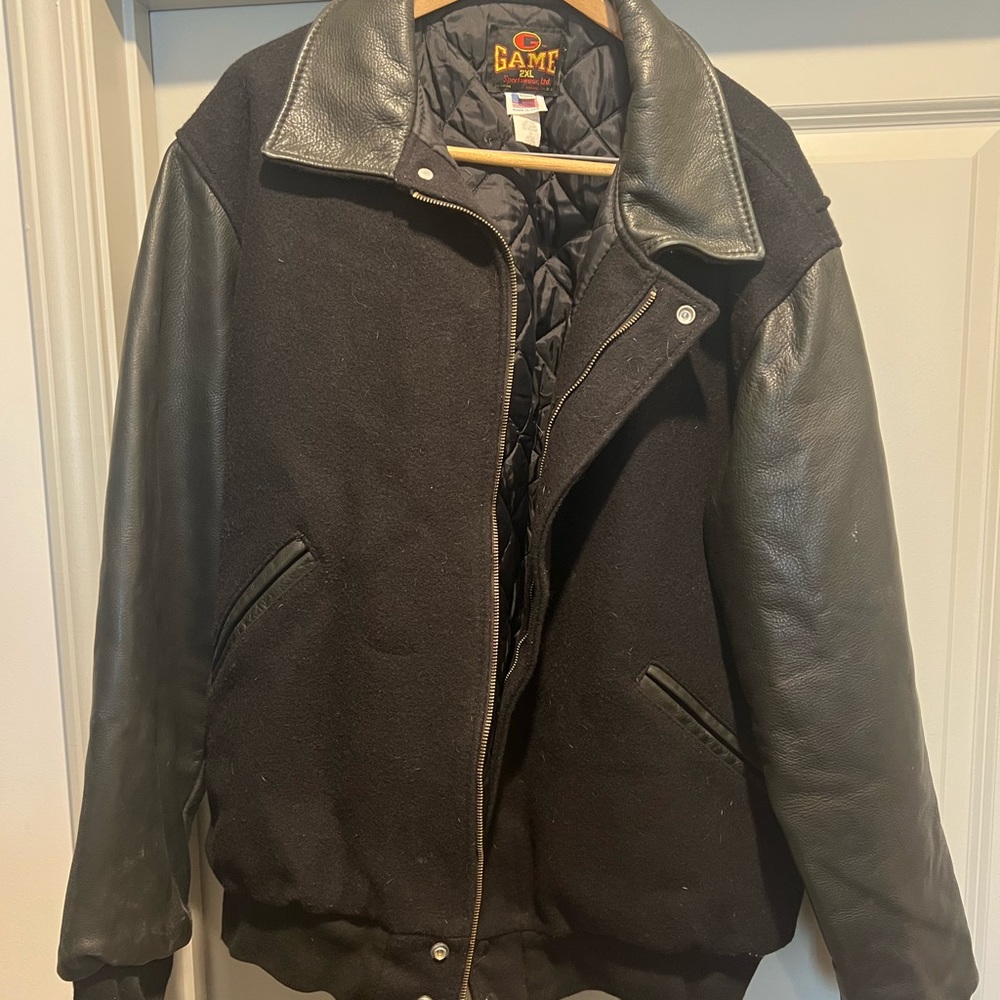 Great looking leather trimmed varsity/bomber jacket.